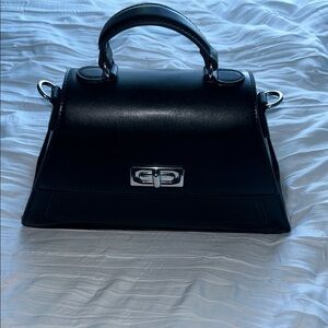 BCBG small Black Handbag with silver accents missing strap